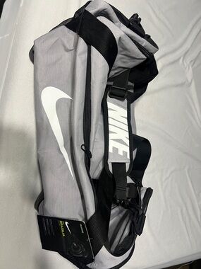 Nike Gray and Black Duffel Bag with White Swoosh